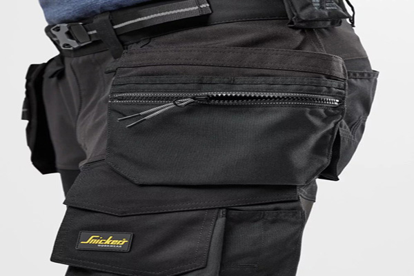 holster pocket with zipper and tool compartments, designed for tradesmen.